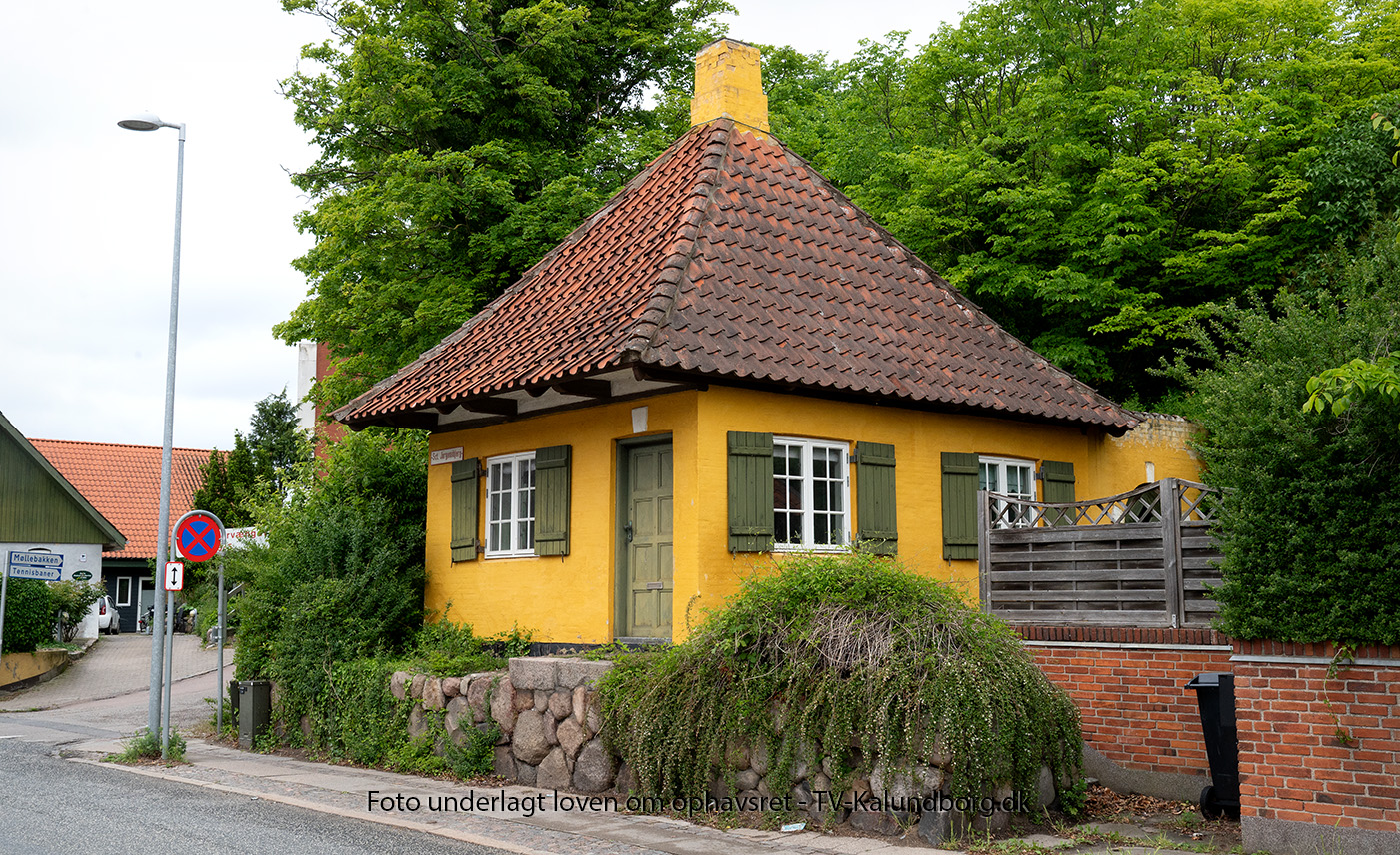 Det lille gule hus med de grønne skodder